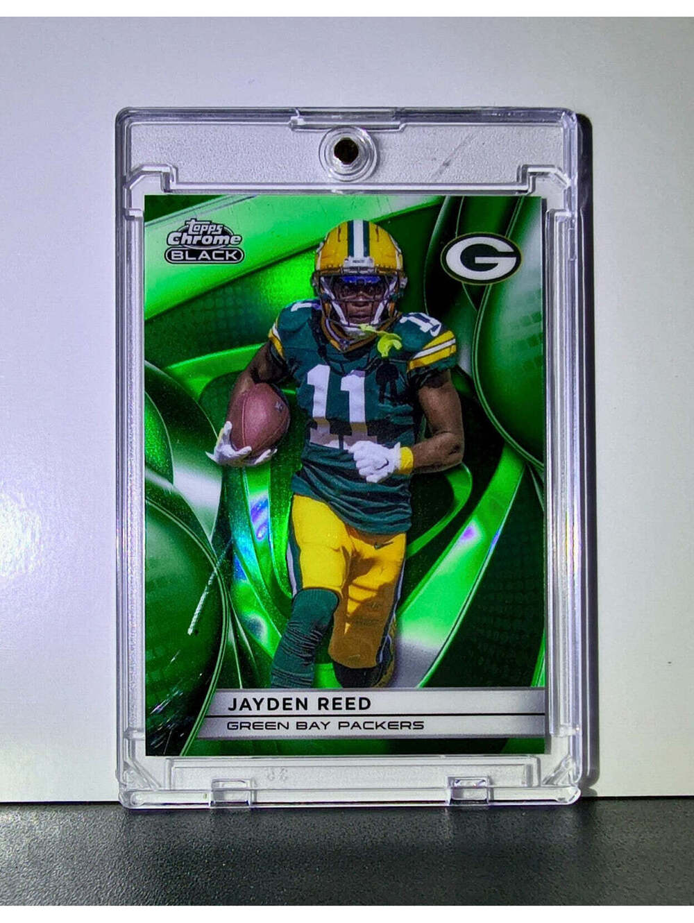 Jayden Reed 2025 NFL Topps Chrome #41 Black Green Refractor Card Packers 29/99